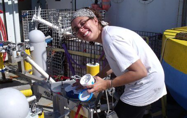Batt makes adjustments to the RV Hugh Sharp during her oceanography research project with the National Science Foundation in 2009. (Photo courtesy of Emily Batt)