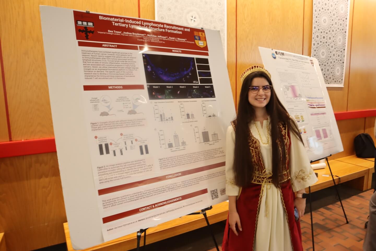 Rea Tresa with her poster