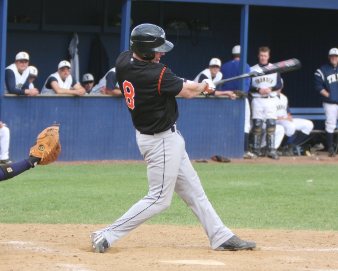 baseball player swinging a bat