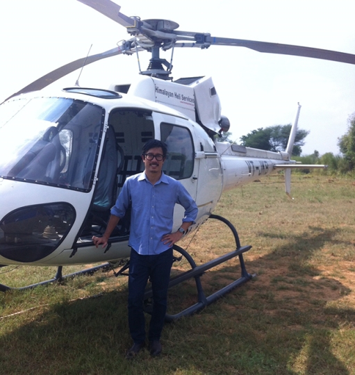Winston Yu prepares to board a helicopter