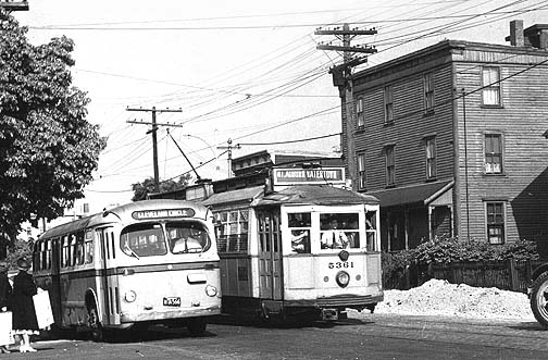 Trolley cars traveling across Western Ave. in Allston during the 1950s.
