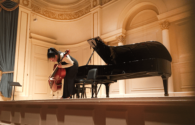 Davis performs as a soloist at Carnegie Hall in New York City.