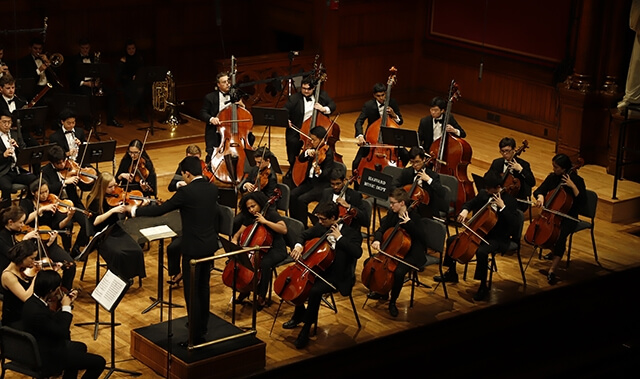 Davis performs Mozart’s Symphony No. 41 with the Harvard-Radcliffe Orchestra.