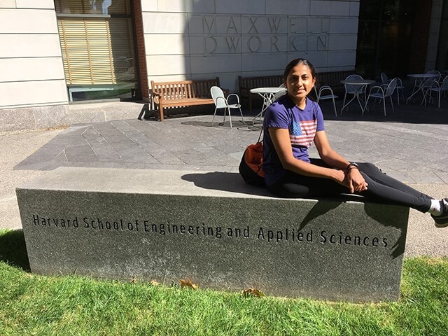 Gayatri Balasubramanian sitting outside the Maxwell-Dworking building.