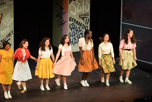 Villafuerte (fourth from left) takes a bow after a successful performance of “West Side Story.”