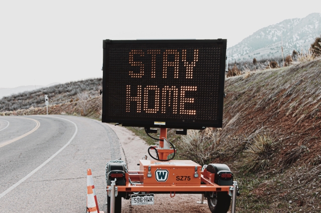 picture of a stay at home sign