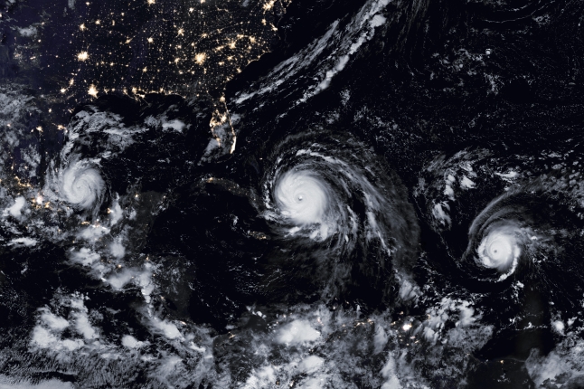 satellite image of three hurricanes 