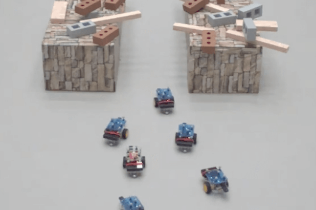 Teams of robots move through difficult terrain